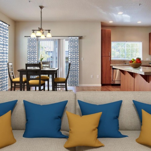 a living room with a couch and a table